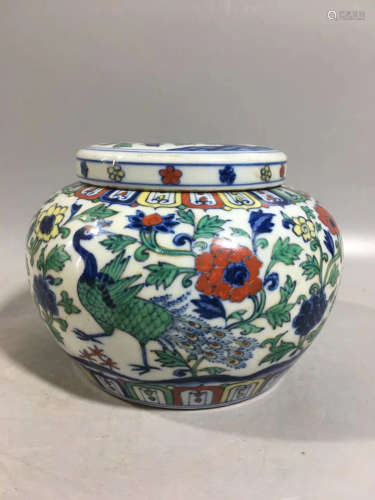A FLOWER PATTERN CLASHING COLOR COVERED JAR