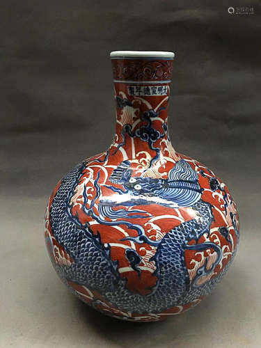 A BLUE&WHITE RED GLAZED DRAGON PATTERN VASE