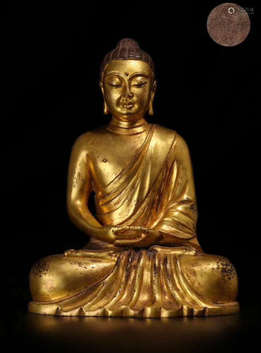 A GITL BRONZE MOLDED BUDDHA STATUE