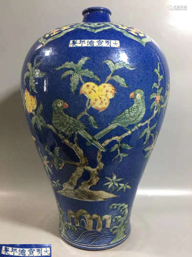 A BLUE GLAZED FLOWER AND BIRD PATTERN MEI VASE