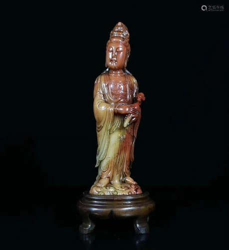 A SOAPSTONE CARVED GUANYIN FIGURE