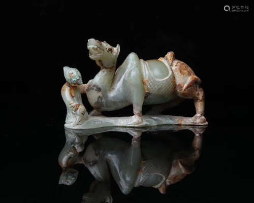 A OLD HETIAN JADE PLAYING LION PENDANT