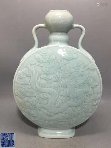 A DOUQING CELADON DRAGON PATTERN VASE