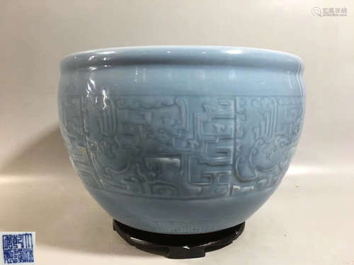 A TIANQING CELADON GLAZED DRAGON PATTERN JAR