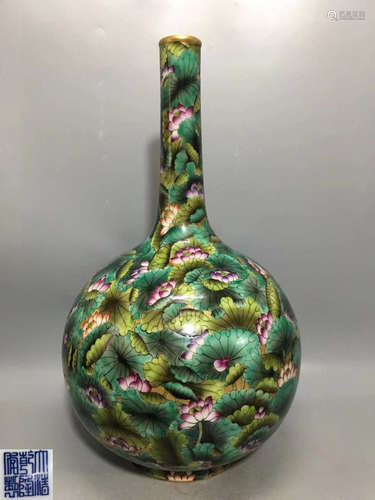 A GREEN GLAZED FLOWER PATTERN LONG NECK VASE