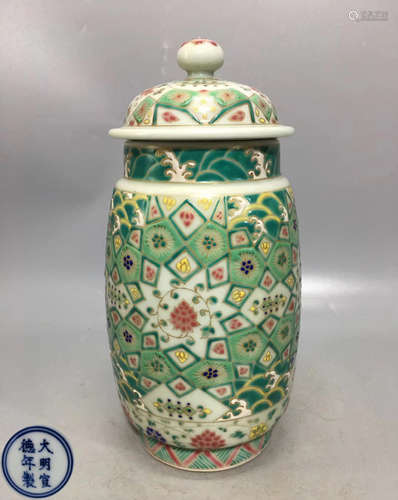 A RED AND GREEN GLAZED FLOWER PATTERN VASE