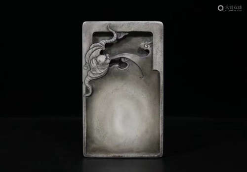 A CARVED BAT INK SLAB