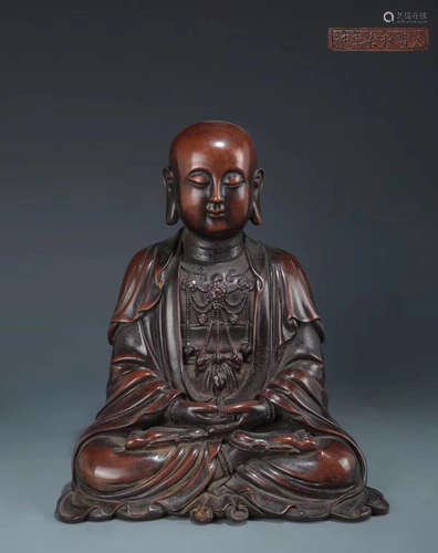 A BRONZE LUOHAN FIGURE