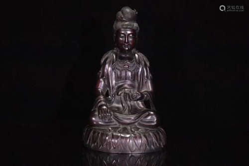 A ZITAN WOOD CARVED GUANYIN STATUE