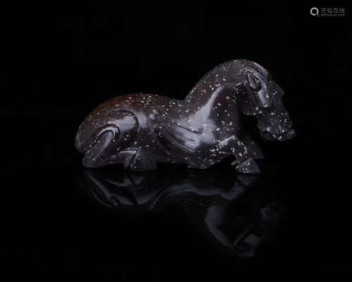 A HETIAN JDAD HORSE SHAPED PENDANT