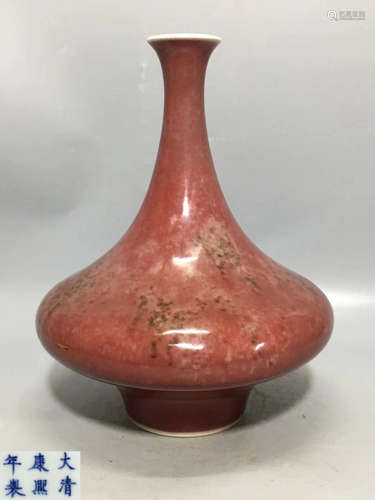 A RED-GLAZED VASE