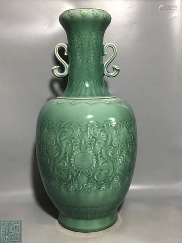 A DOUQING CELADON DRAGON PATTERN VASE