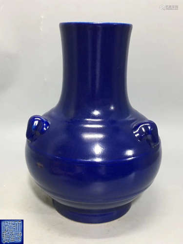 A BLUE GLAZED VASE