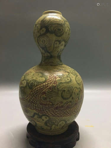 A BLUE AND UNDERGLAZE RED GOURD-SHAPED VASE