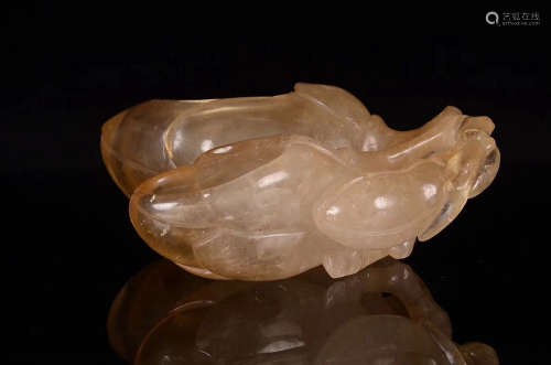 A CRYSTAL CARVED ORCHID SHAPED BRUSH PIECE