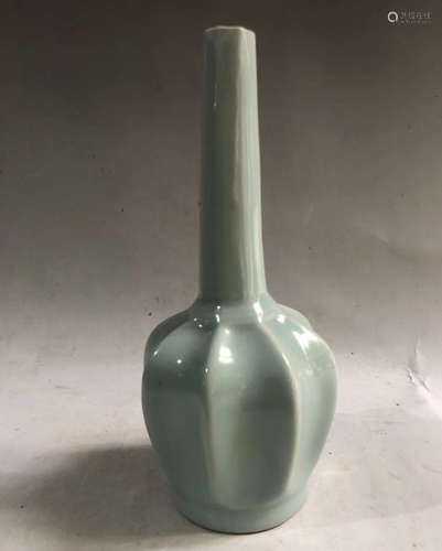 A CELADON GLAZED MELON SHAPED VASE