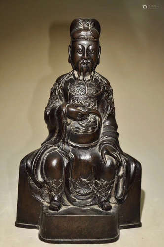 A BRONZE MOLDED FIGURE STATUE