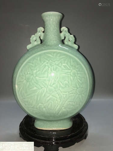 A DOUQING CELADON FLAT VASE