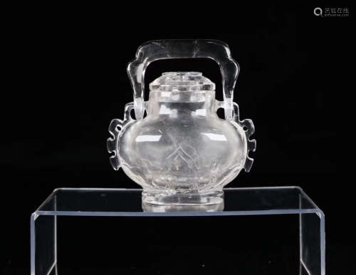 A CRYSTAL CARVED HANDLE POT