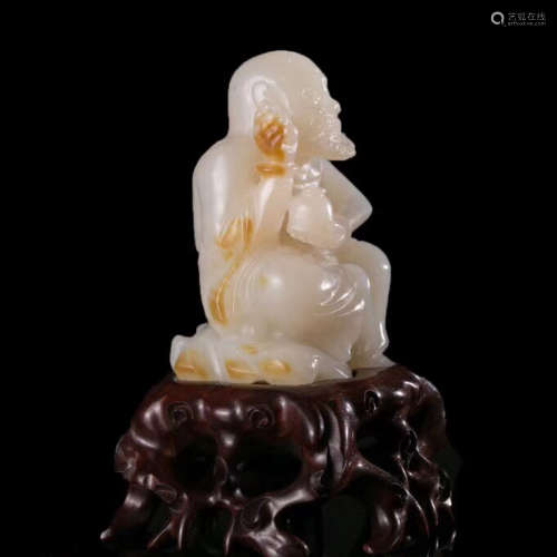 A HETIAN JADE CARVED LUOHAN BUDDHA STATUE