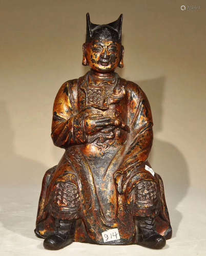 A BRONZE MOLDED FIGURE STATUE