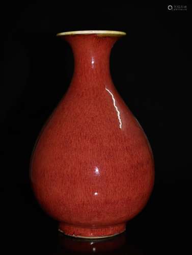 AN ALTAR RED PORCELAIN VASE