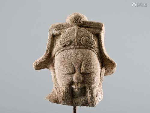 STONE CARVED CHARACTER FIGURE