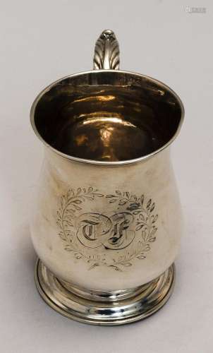 GEORGE II STERLING SILVER MUG William Shaw & William Priest, maker. Balustroid form with spreading molded foot and scrolled handle w...