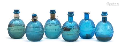 SIX HARDENS HAND GRENADE FIRE EXTINGUISHERS Turquoise blue molded glass grenades with molded maker's mark. Includes a wire wall-moun..