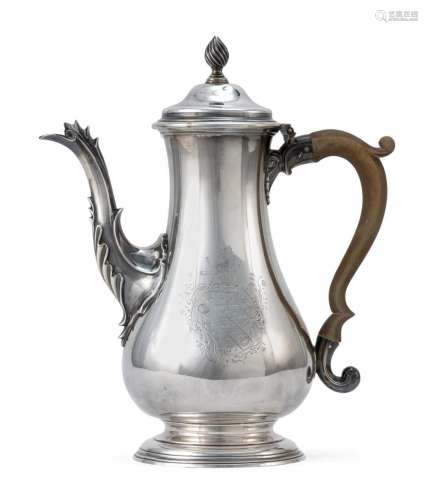 GEORGE III STERLING SILVER COFFEEPOT Alexander Johnston, maker. Domed cover with flame finial. Pear-form body with foliate spout and...
