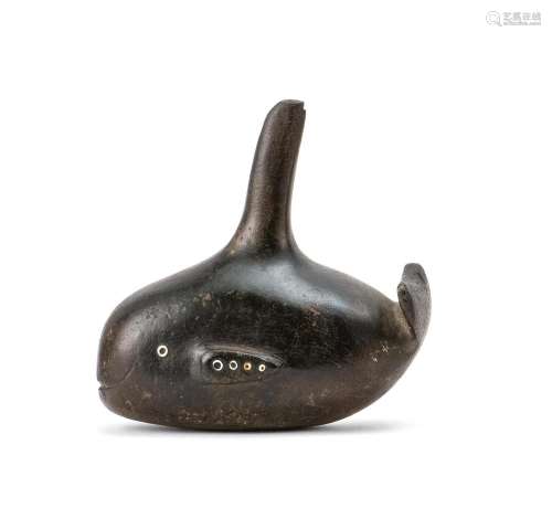 STEATITE FIGURE OF A WHALE, ATTRIBUTED TO THE CHUMASH Bone inlaid eyes. Flippers with further bone inlay. Height 4