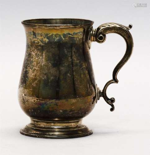 GEORGE III STERLING SILVER MUG Thomas Wallis I, maker. Balustroid form with spreading molded foot, scrolled handle and foliate thumb...