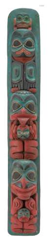 CARVED CEDAR HOUSE POST, PROBABLY HAIDA Nicely carved and painted red, black and blue. Nice patina. Height 34.75