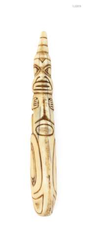 HAIDA CARVED WALRUS IVORY AMULET With sea monster and totem design.