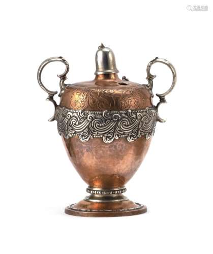 TIFFANY & CO. MIXED METAL SPIRIT LAMP Urn-form copper body with acid-etched monogram on shoulder. Sterling silver handles, applied s...