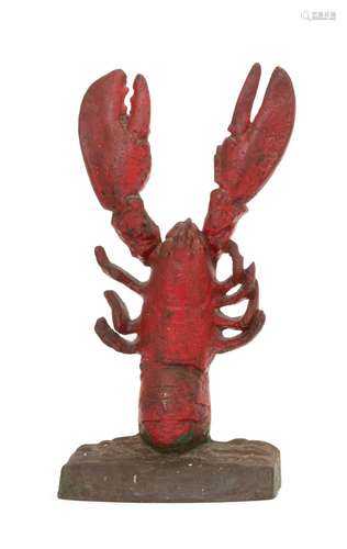 CAST IRON LOBSTER DOORSTOP Red lobster on a rockery base. Height 12.75