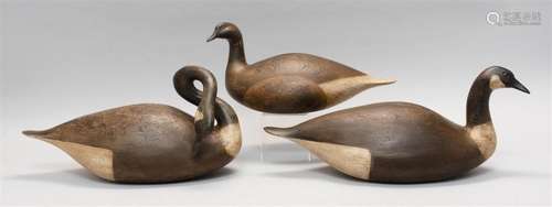 THREE JIM KEEFER DECOYS Two Canada geese and a brant. All hollow-carved and with an antiqued finish. All signed on undersides 