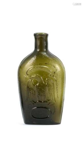 HISTORICAL BLOWN-MOLDED GLASS FLASK In amber. Both sides with molded eagle and Liberty shield decoration. Height 6