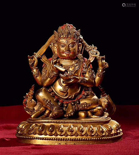 A TIBETAN MAHAKALA DESIGN GILT BRONZE FIGURE