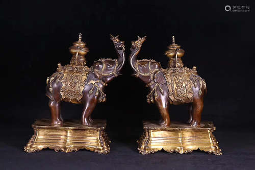 A PAIR OF OLD TIBETAN ELEPHANT DESIGN GILT BRONZE ORNAMENTS