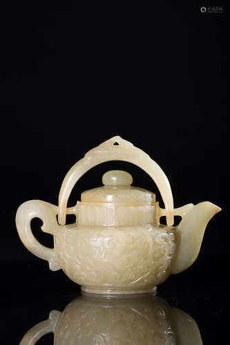 20TH CENTURY, A LOOP-HANDLED TEAPOT DESIGN HETIAN JADE ORNAMENT, CHUANGHUI PERIOD