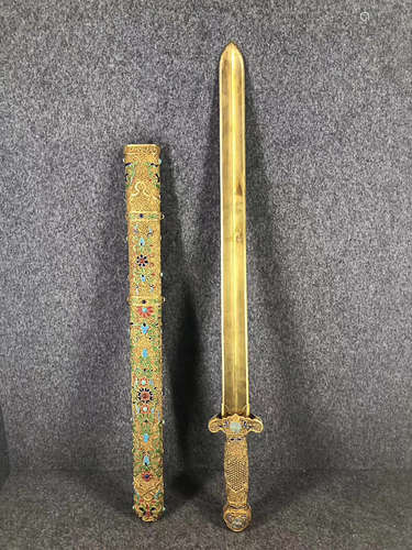 A GILT BRONZE SWORD