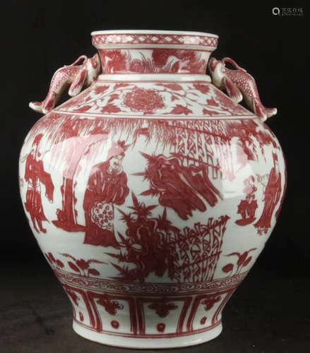 A STORY DESIGN RED GLAZED DOUBLE-EAR JAR