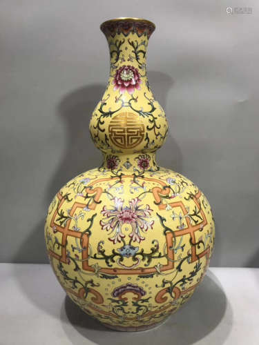 A WESTERN COLOR YELLOW GLAZED GOURD VASE