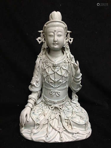 A GUANYIN DESIGN WHITE GLAZED FIGURE