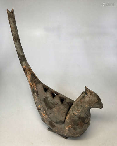 A CAST IRON CHILD BIRD SHAPED INCENSE WARE