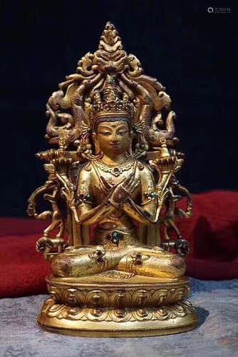 A TIBETAN BUDDHA DESIGN GILT FIGURE