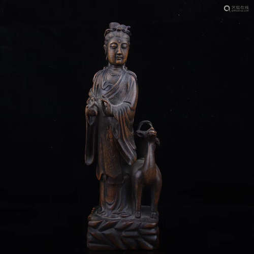 A QING DYNASTY EAGLEWOOD GUANYIN ORNAMENT