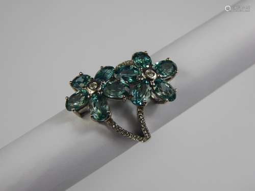 A 9ct White Gold Blue Apatite and Diamond Ring