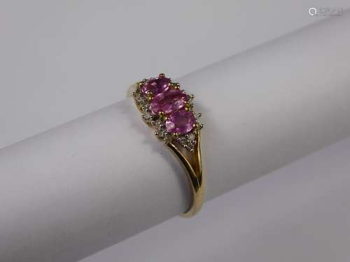 A 9ct Yellow Gold Pink Sapphire and Diamond Ring